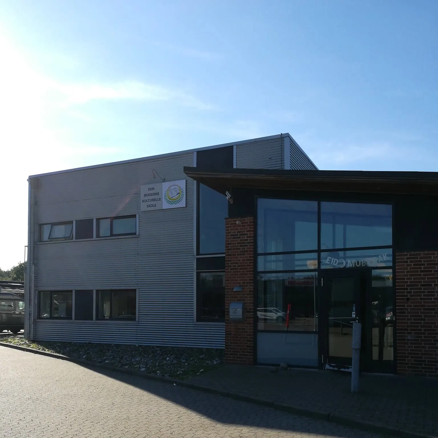 Den Moderne Kulturelle skole logo