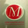 Logo Mitzy Eten & Drinken