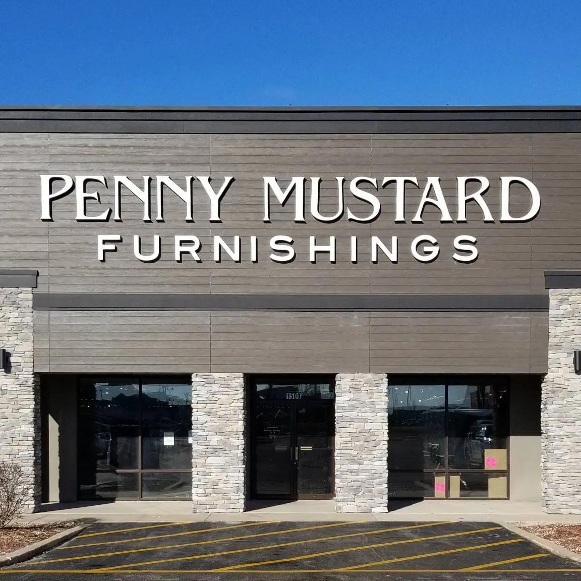 Penny Mustard Furnishings logo