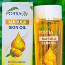 Portia M logo