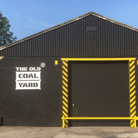 The Old Coal Yard logo