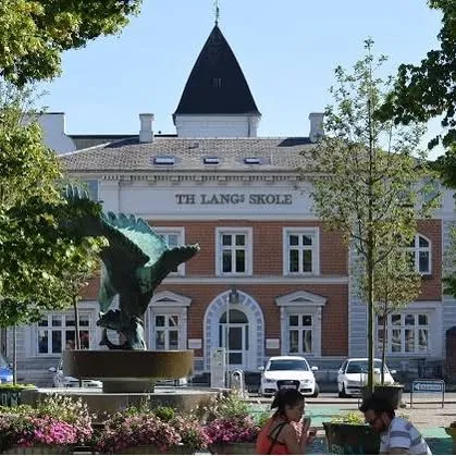 Th. Langs Skole logo